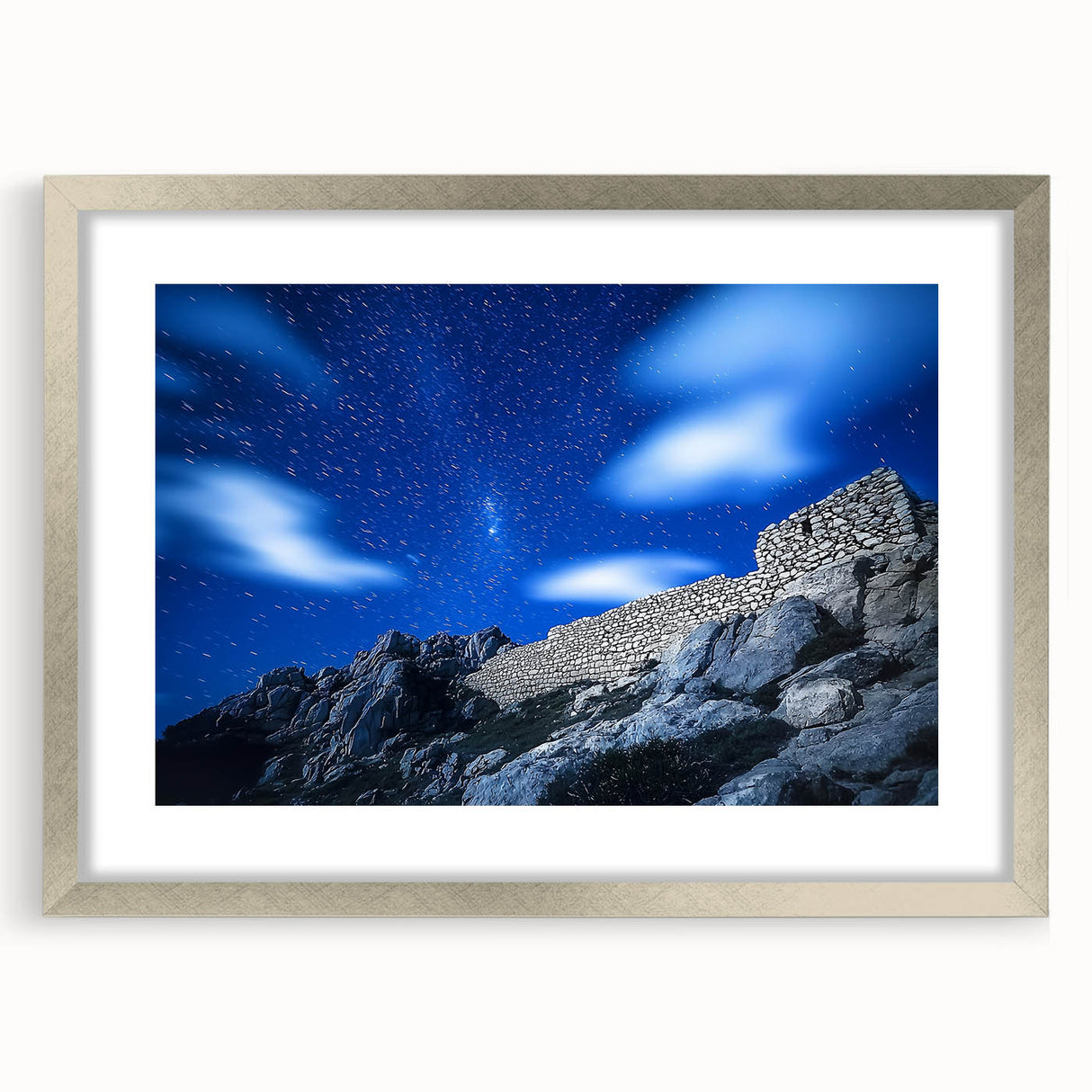 Framed landscape artwork depicting majestic cliffs with a silver mat, showcasing natural beauty and elegance, perfect for home decor or office enhancement.