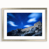 Framed landscape artwork depicting majestic cliffs with a silver mat, showcasing natural beauty and elegance, perfect for home decor or office enhancement.