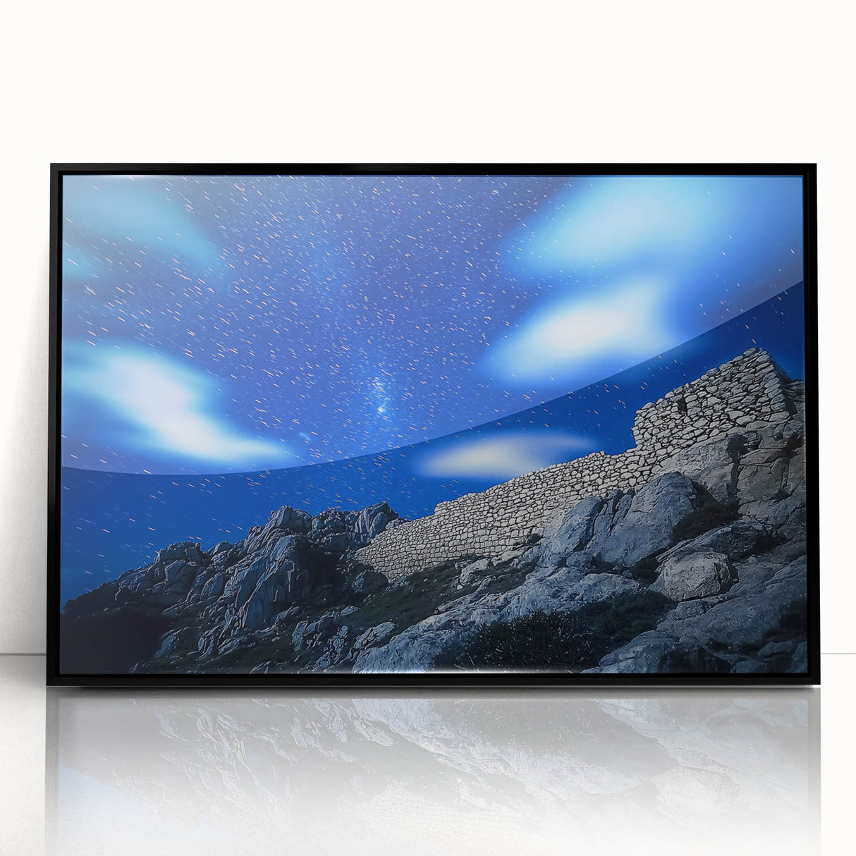 Framed acrylic artwork showcasing a dramatic landscape of cliffs, emphasizing rich colors and intricate details, set in a sleek black frame for a modern touch.