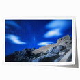 Stunning rolled canvas print showcasing a breathtaking landscape of rugged cliffs and serene waters, ideal for home decor or gallery displays, packaged securely in a protective cardboard tube.