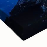 Close-up of a stretched canvas depicting a dramatic landscape of cliffs, showcasing intricate textures and vibrant colors, ideal for home decor enthusiasts.