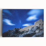 Stretched canvas art depicting a breathtaking landscape of rugged cliffs under a vibrant sunset, showcasing rich colors and dramatic textures, ideal for home decor.