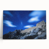 Stretched canvas artwork showcasing a dramatic landscape of rugged cliffs under a vibrant sunset, perfect for enhancing modern home decor with natural beauty.