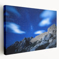 Stretched canvas artwork showcasing a dramatic cliff landscape in vibrant colors, perfect for home decor, enhancing any room's aesthetic with nature's beauty.