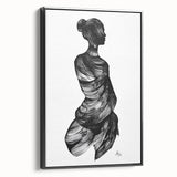 Abstract figurative framed canvas artwork showcasing a dynamic design with bold colors and shapes, displayed in a black frame, ideal for modern home decor.