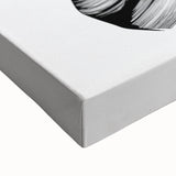 Close-up of an abstract figurative stretched canvas artwork showcasing vibrant colors and dynamic shapes, perfect for modern home decor or art enthusiasts.