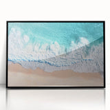 Framed acrylic artwork depicting a serene beach landscape, showcasing vibrant colors and intricate details, with a sleek black frame enhancing its modern aesthetic. Perfect for coastal decor enthusiasts seeking to elevate their living space.