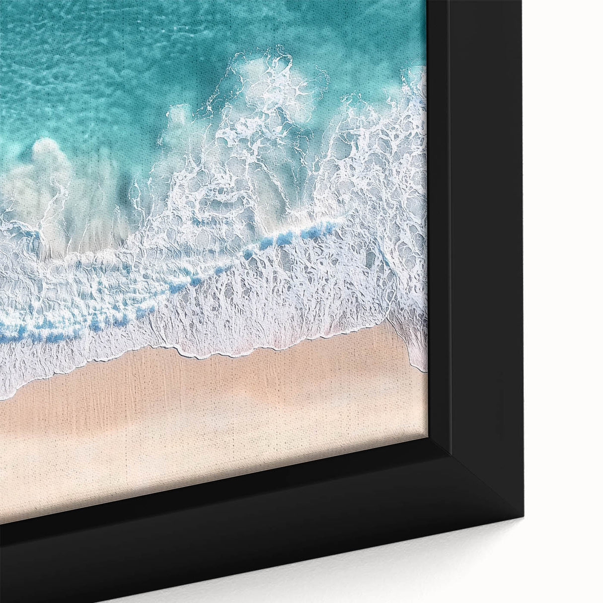 Framed landscape canvas depicting a serene beach scene with golden sand and turquoise waves, showcasing vibrant colors and intricate details for a calming decor accent.