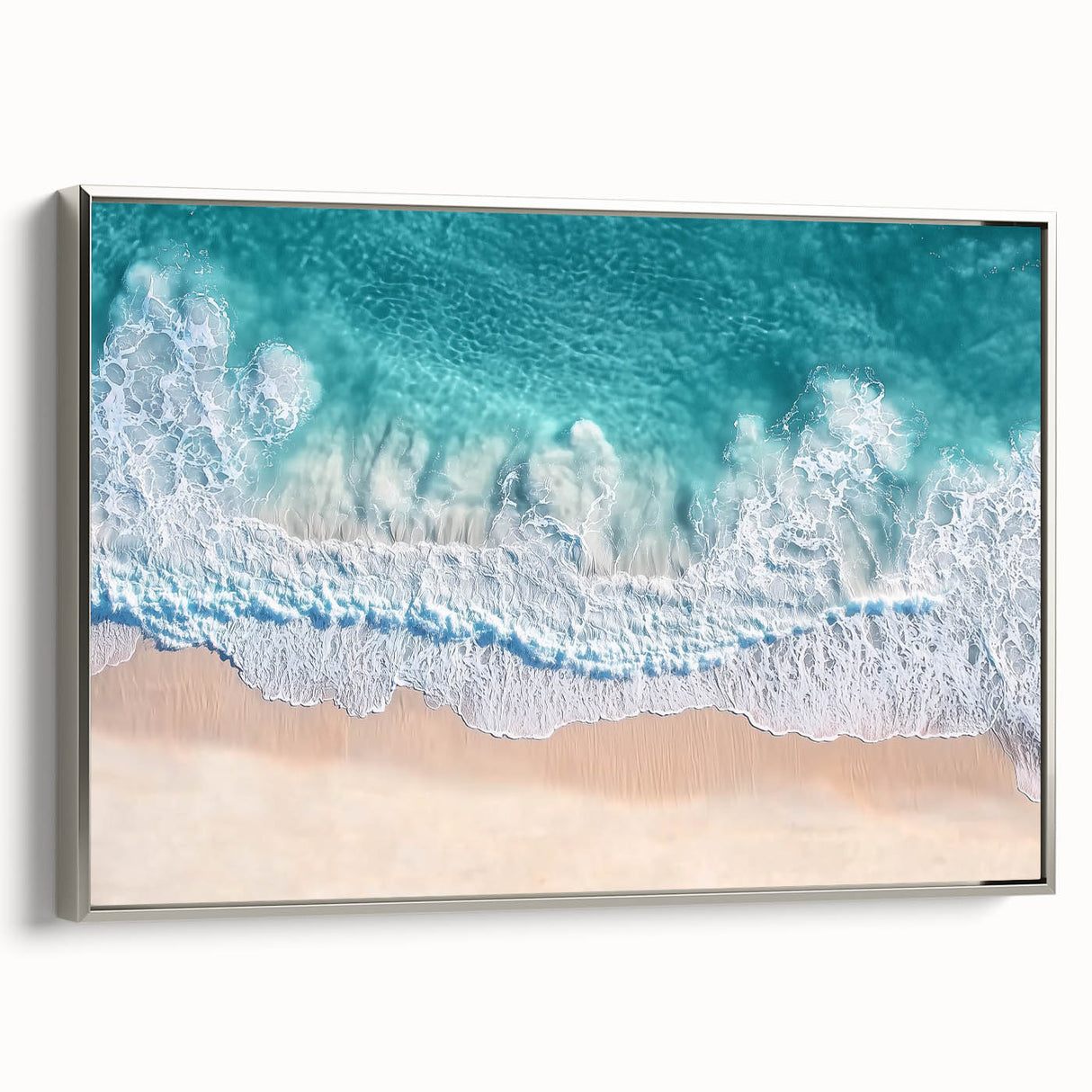 Framed canvas artwork showcasing a serene beach landscape, featuring soft pastel colors and a silver frame, ideal for coastal-themed home decor and relaxation.