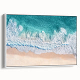 Framed canvas art depicting a serene beach landscape with soft pastel colors, showcasing tranquil waves and a clear sky, perfect for coastal home decor.