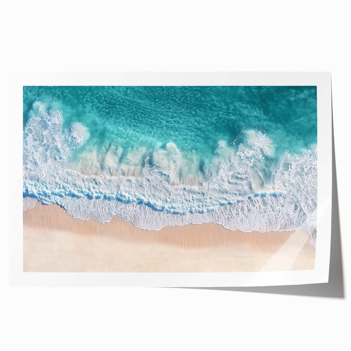 Vibrant rolled print of a serene beach landscape featuring turquoise waters and golden sand, artistically designed for home decor, presented in a protective tube.