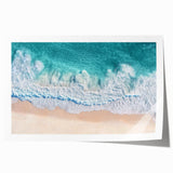 Vibrant rolled print of a serene beach landscape featuring turquoise waters and golden sand, artistically designed for home decor, presented in a protective tube.