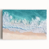 Stretched canvas artwork depicting a serene beach landscape with soft waves and a pastel sky. Ideal for coastal-themed decor, enhancing relaxation in any space.