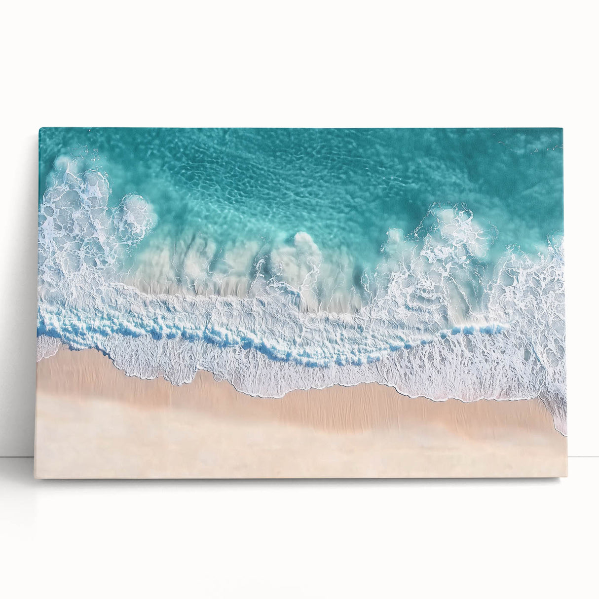 Stretched canvas artwork depicting a serene beach landscape with vibrant colors and soft waves, perfect for enhancing home decor with a coastal theme.