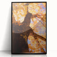 Large abstract wall art featuring swirling autumn colors on a black framed acrylic, ideal for modern living room decor.