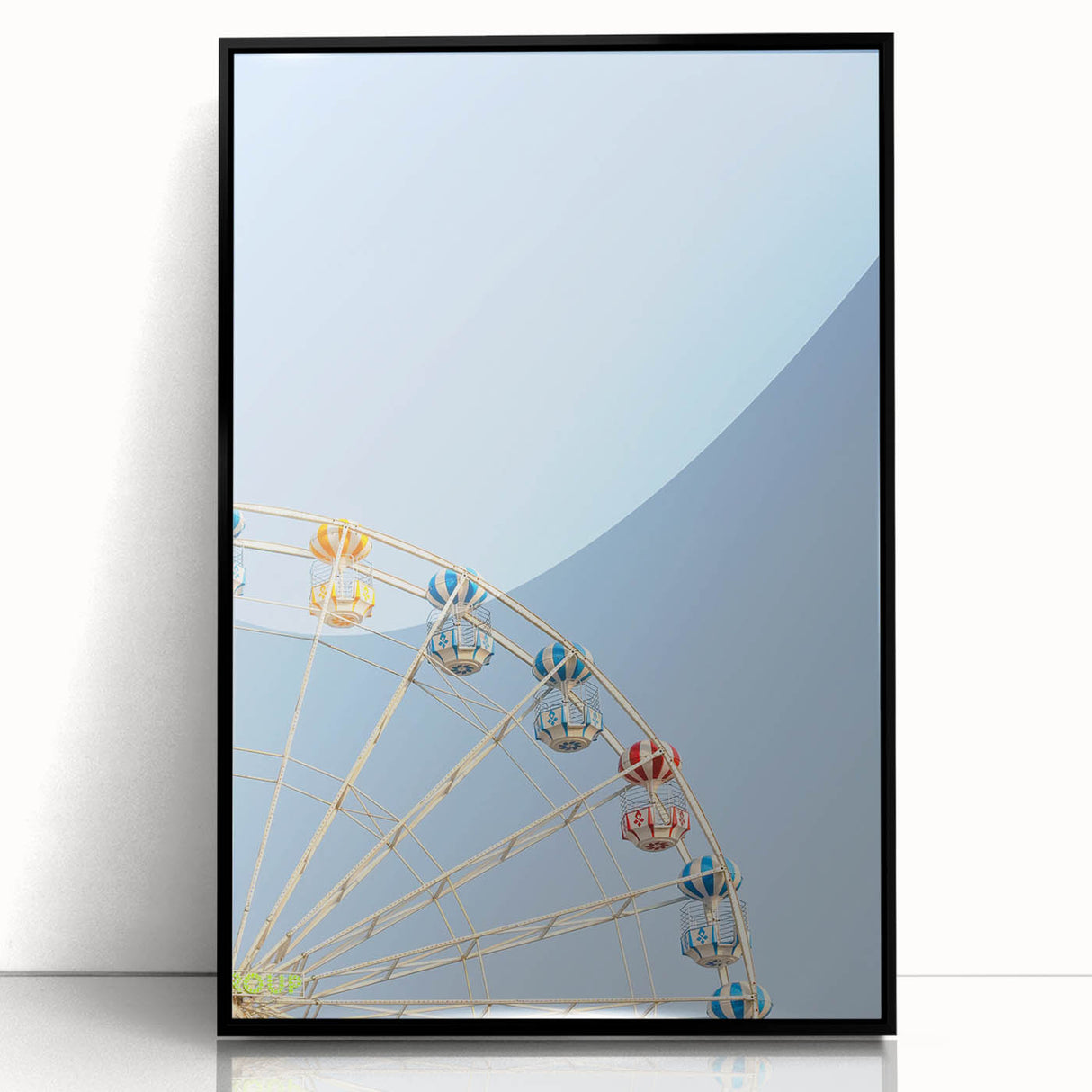 Large abstract wall art depicting summer season in vibrant yellows and greens on a black framed acrylic.