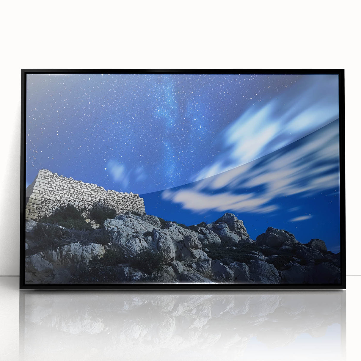 Framed acrylic artwork depicting a dramatic landscape of cliffs, showcasing vibrant colors and intricate details, perfect for modern home decor.