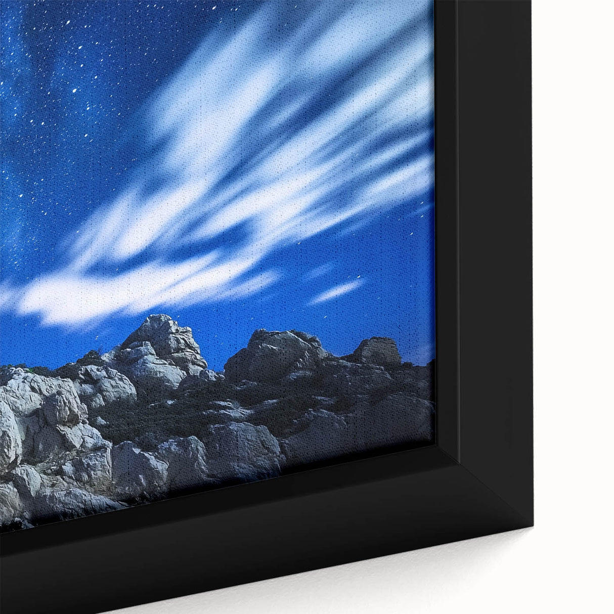 Close-up of a stunning framed canvas depicting vibrant landscapes with dramatic cliffs, showcasing intricate textures and rich colors, perfect for home decor.