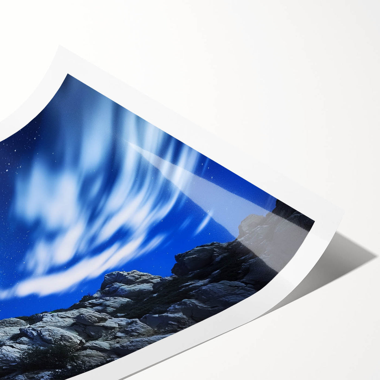 Stunning landscape print showcasing majestic cliffs along a serene coastline, expertly rolled for easy display and protection, perfect for nature lovers and home decor enthusiasts.