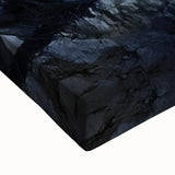 Close-up of a vibrant stretched canvas depicting a dramatic cliff landscape, showcasing rich colors and detailed textures, ideal for home decor enthusiasts.