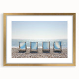 Elegant landscape artwork framed in gold, featuring serene beach scenery with soft waves and vibrant sunset hues, perfect for home decor or office ambiance.