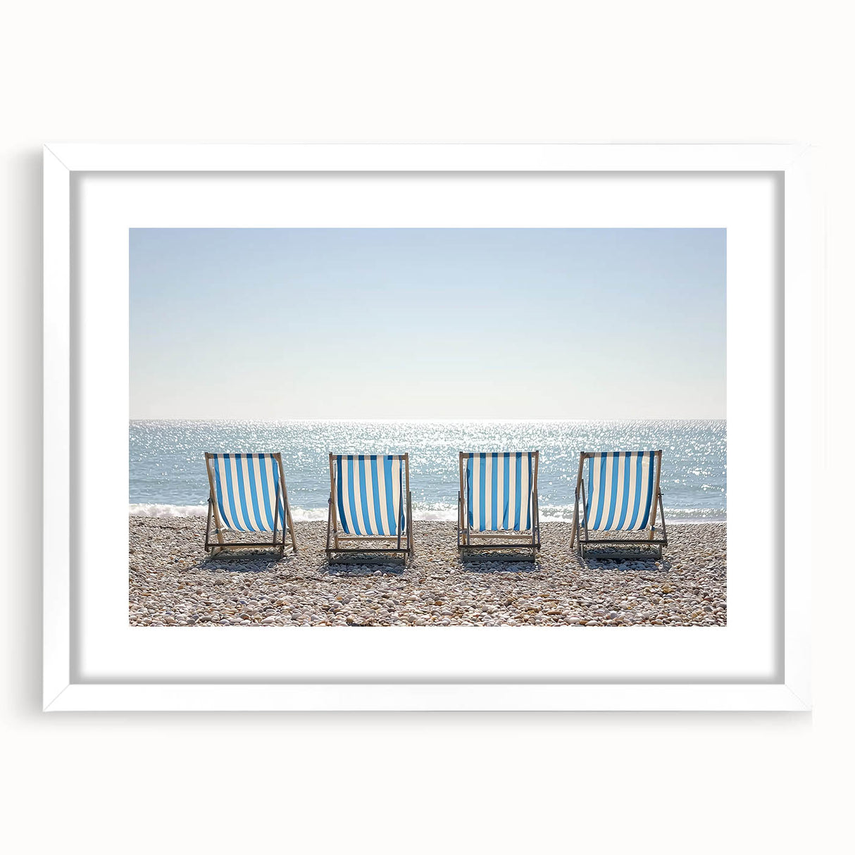 Landscape artwork featuring serene beaches, framed with a white mat, showcasing vibrant colors and tranquil ocean waves, perfect for coastal home decor.