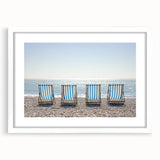 Landscape artwork featuring serene beaches, framed with a white mat, showcasing vibrant colors and tranquil ocean waves, perfect for coastal home decor.