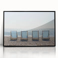 Framed acrylic artwork showcasing a serene beach landscape with vibrant colors, set against a sleek black frame, perfect for coastal-themed decor.
