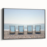 Framed canvas artwork depicting a serene beach landscape, featuring vibrant colors and detailed textures, showcased in a sleek black frame from a side view. Ideal for enhancing coastal-themed decor.