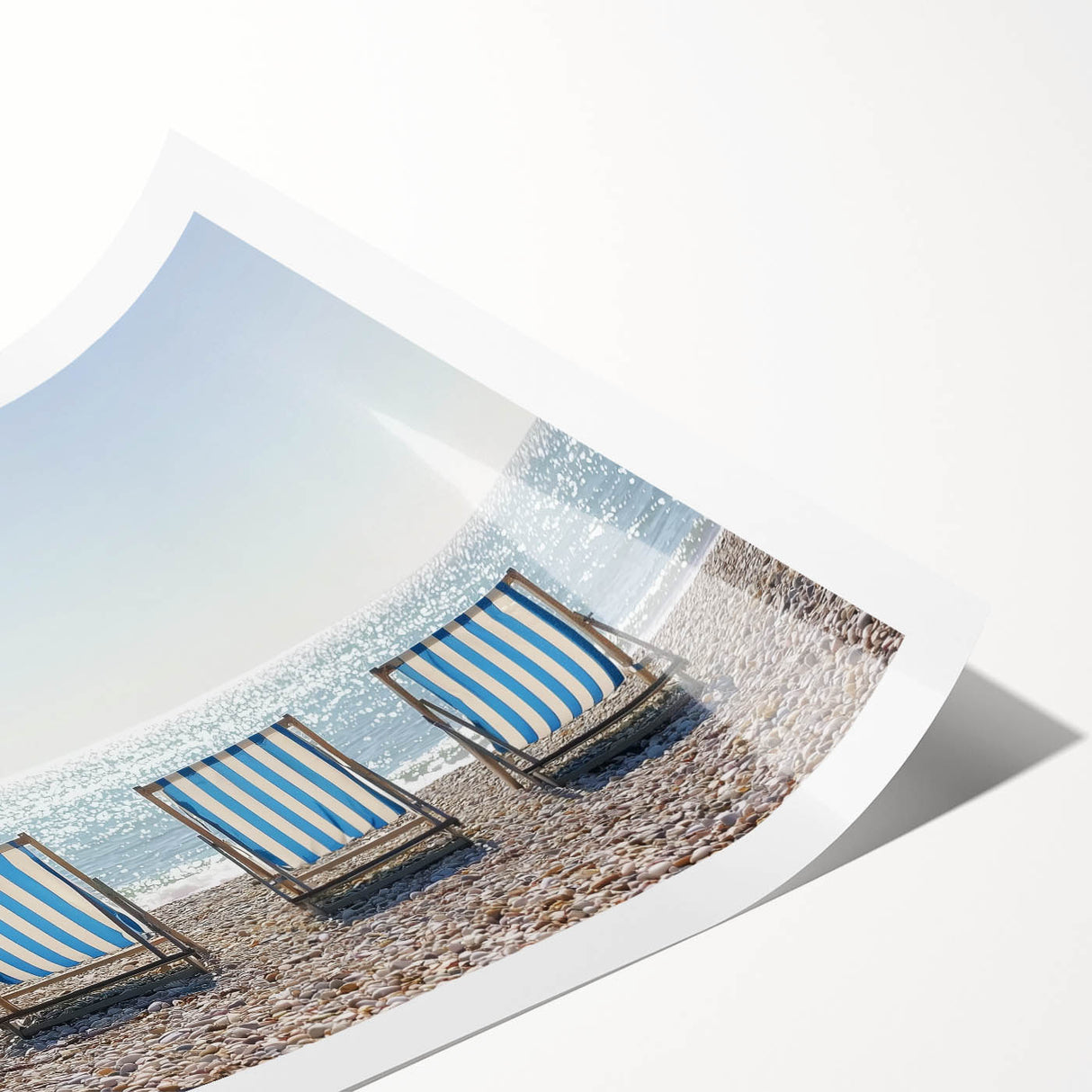 Stunning landscape artwork print showcasing serene beach scenery with vibrant blue skies, soft sands, and gentle waves, rolled for easy transport and display.