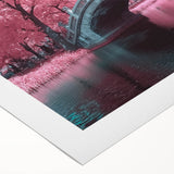 Rolled canvas art depicting a vibrant landscape bridge scene with lush greenery and a serene waterway, elegantly packaged in a sturdy tube for safe transport.