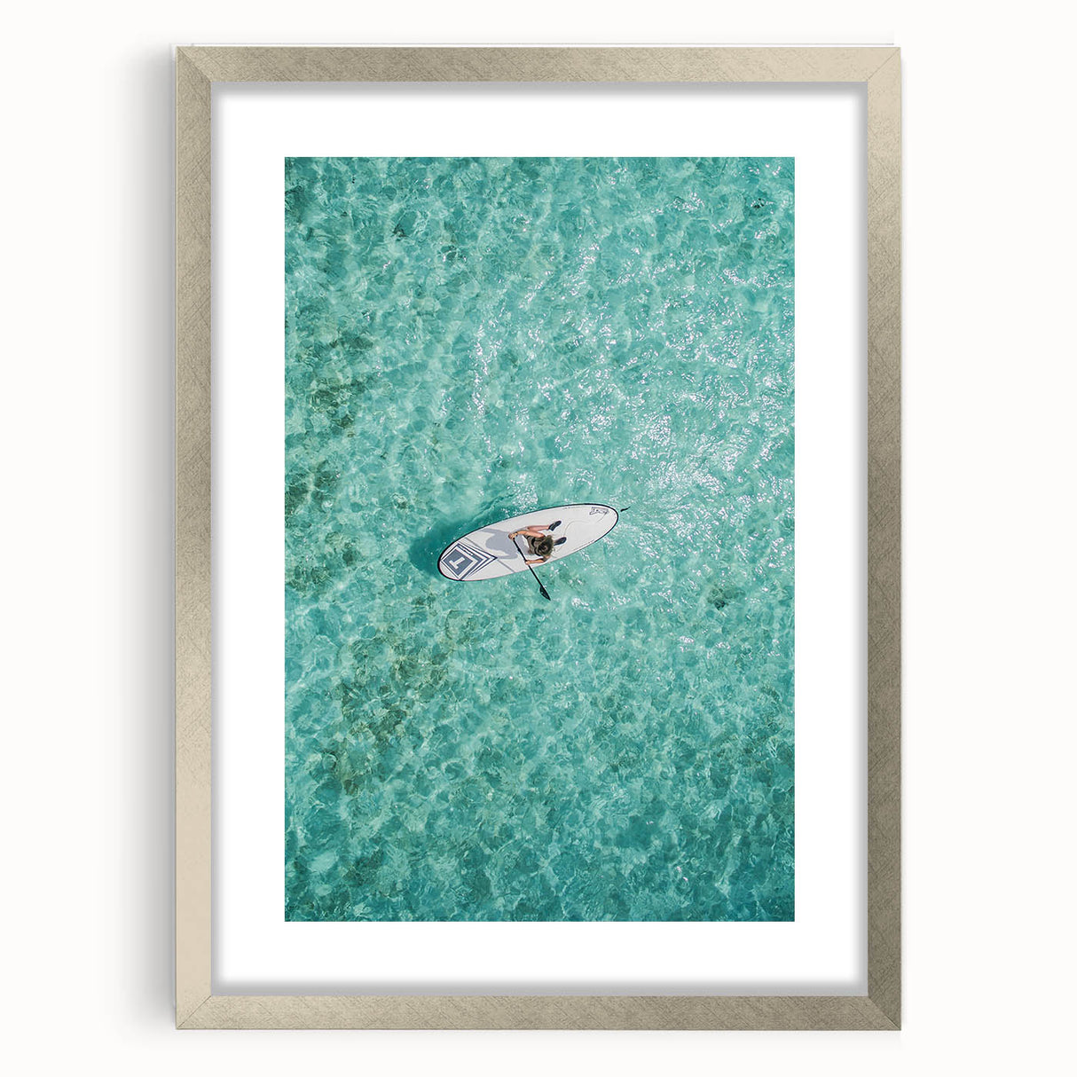 Textured abstract art print in vibrant orange and yellow hues on a silver-framed canvas, suitable for bedroom decor.