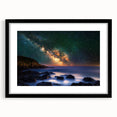 Black-framed landscape artwork featuring dramatic cliffs and a serene sky, matted for an elegant presentation, ideal for enhancing modern home decor.