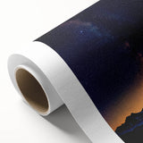 Rolled canvas showcasing vibrant African tribal art design with intricate patterns and rich colors, securely packaged in a protective cardboard tube for easy shipping.