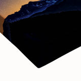 Close-up of a landscape-stretched canvas showcasing vibrant African-inspired wall art design with intricate patterns and rich colors, ideal for home decor.