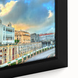 Extra large framed canvas featuring a textured depiction of an Algerian landscape in black with colorful accents.