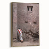 Framed canvas depicting an Ethiopian landscape with colorful, vintage-style art, ideal for enhancing a living room or study.