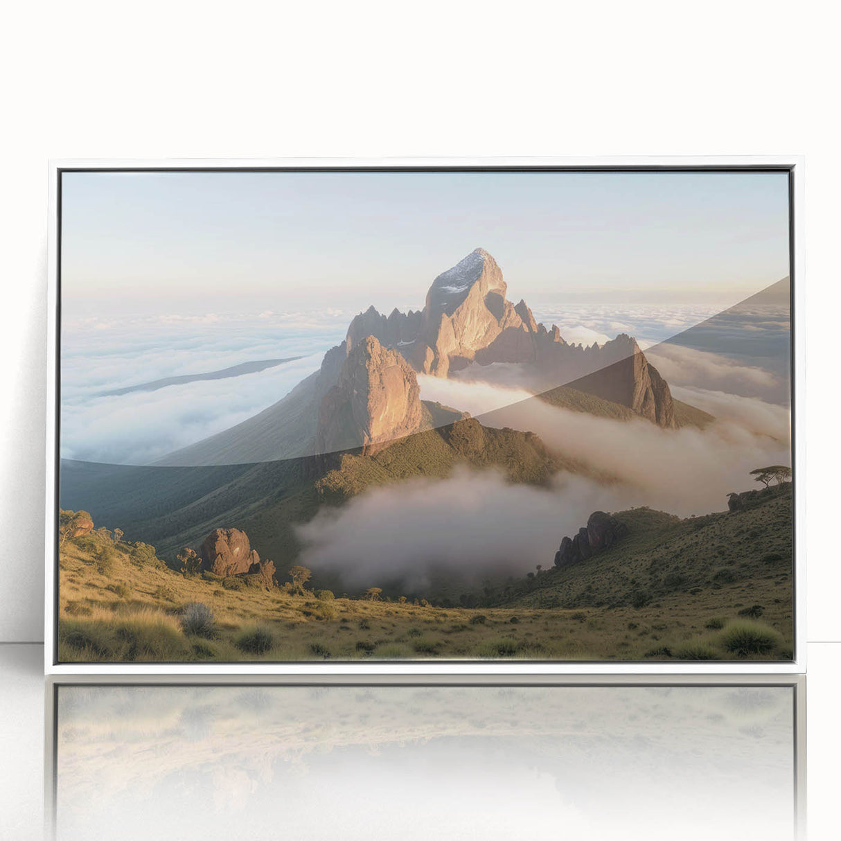 Acrylic print of a Kenyan landscape in muted earth tones, framed in white, suitable for modern nursery decor.