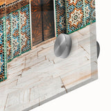 Large abstract wall art featuring Moroccan scenery in muted earth tones on acrylic glass, suitable for dining room ambiance.