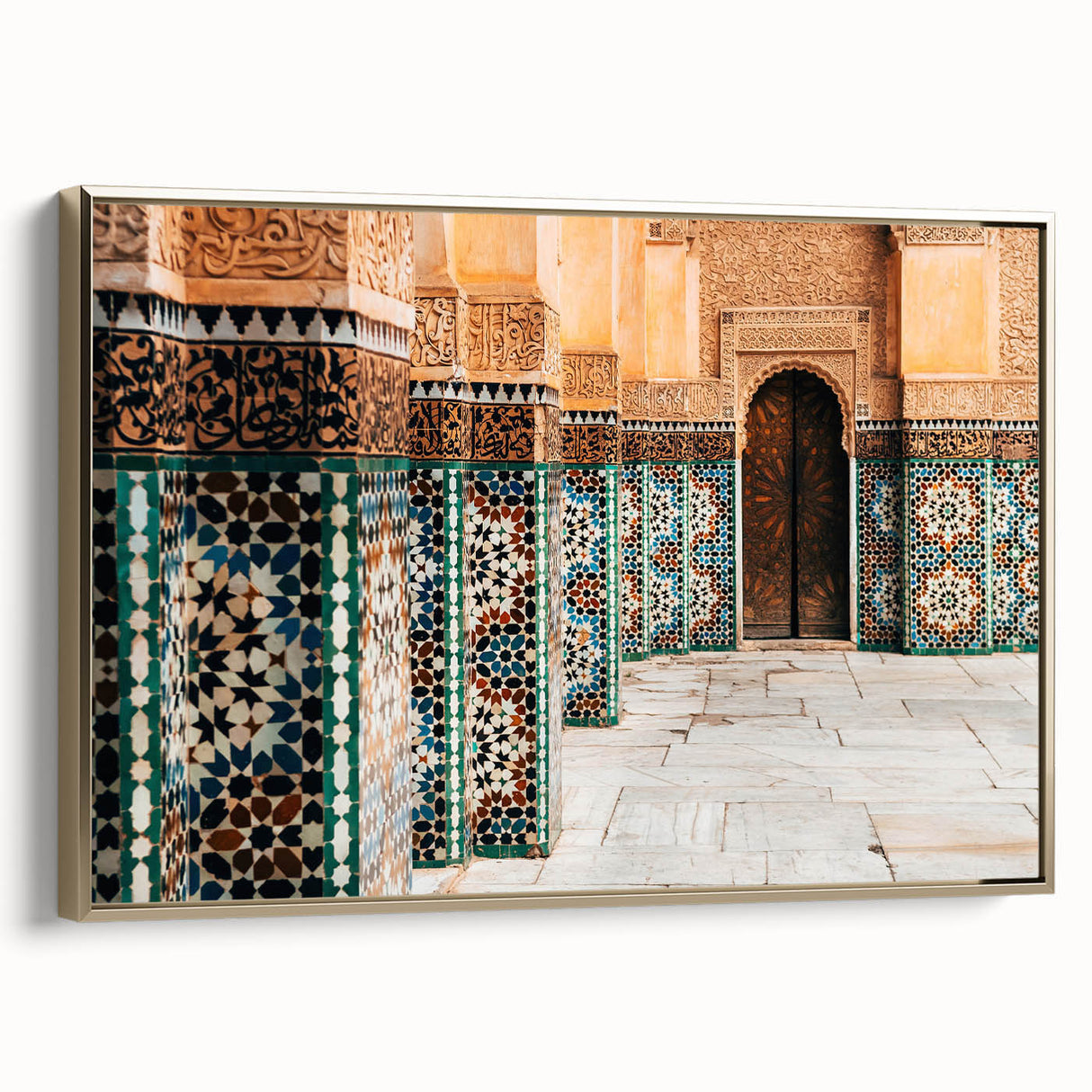 Framed canvas depicting a Moroccan landscape with vibrant colors on a black background, ideal for living room decor.