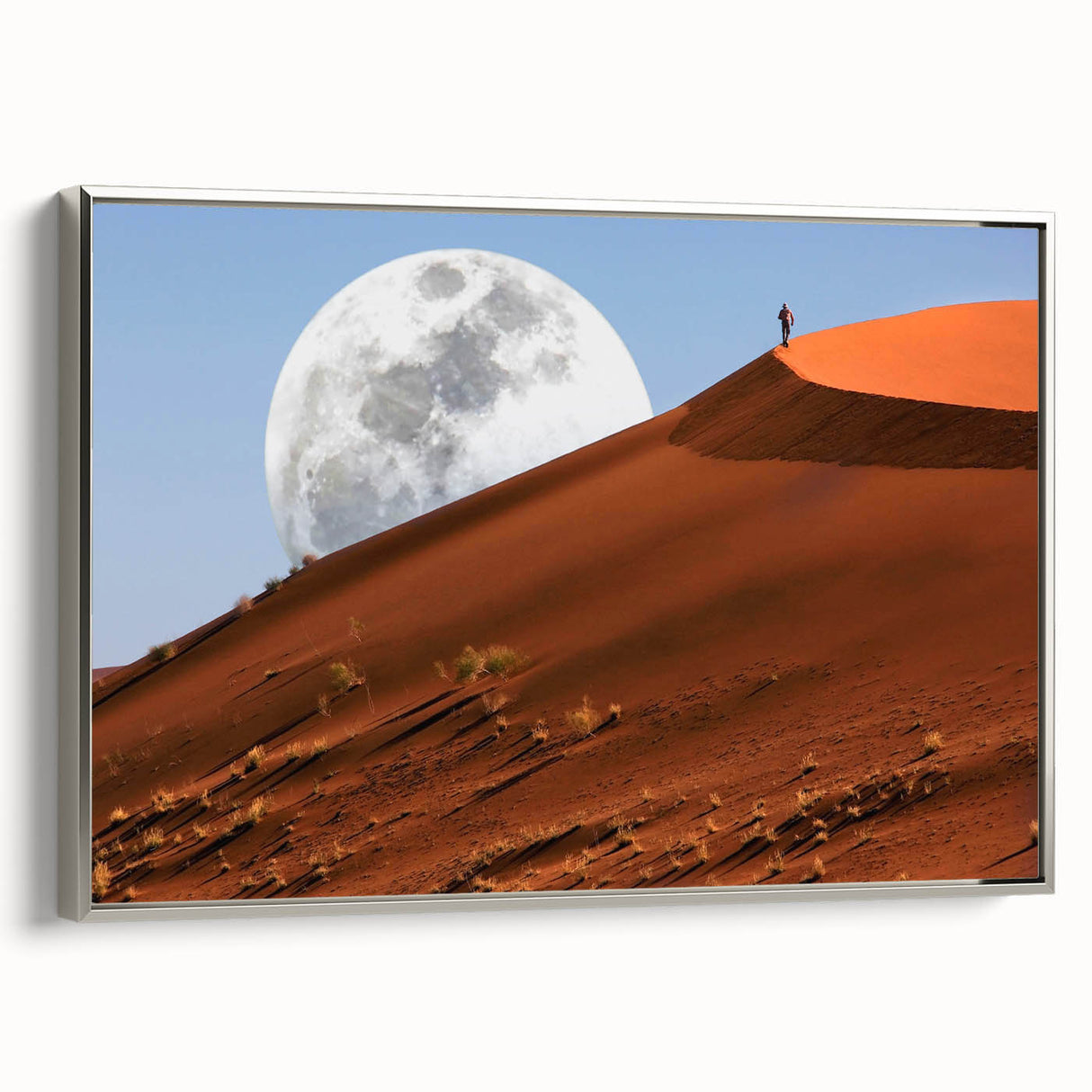 Vintage poster art of a Namibian landscape on framed canvas, featuring a silver frame and a palette of earth tones.
