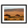 Extra large abstract art print of a colorful African landscape on a textured canvas, framed in black.