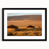 Extra large abstract art print of a colorful African landscape on a textured canvas, framed in black.