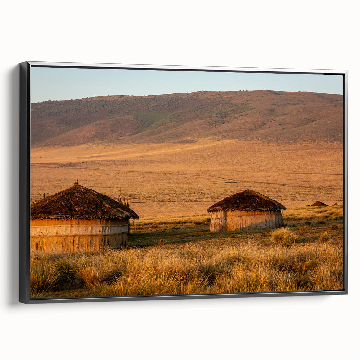 Black and white framed canvas depicting a vintage-style Tanzanian landscape, ideal for bedroom wall decor.