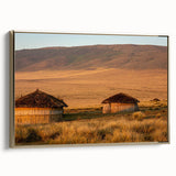 Framed canvas depicting a serene Tanzanian landscape in muted earth tones, ideal for bedroom wall art.