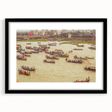 Colorful abstract art print of a textured scenery, in a large black frame, ideal for living room decor.