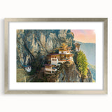 Textured art print of an abstract Bhutanese landscape in muted earth tones, framed in silver, ideal for bedroom decor.