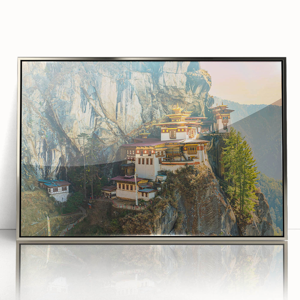 Mid-century modernist art of Bhutan scenery in silver-framed acrylic, featuring muted earth tones.