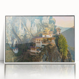 Acrylic print of a serene Bhutanese landscape in muted earth tones, framed in white.