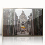 Large art print of a Cambodian landscape in muted earth tones, framed in gold acrylic, suitable for modern art wall decor.